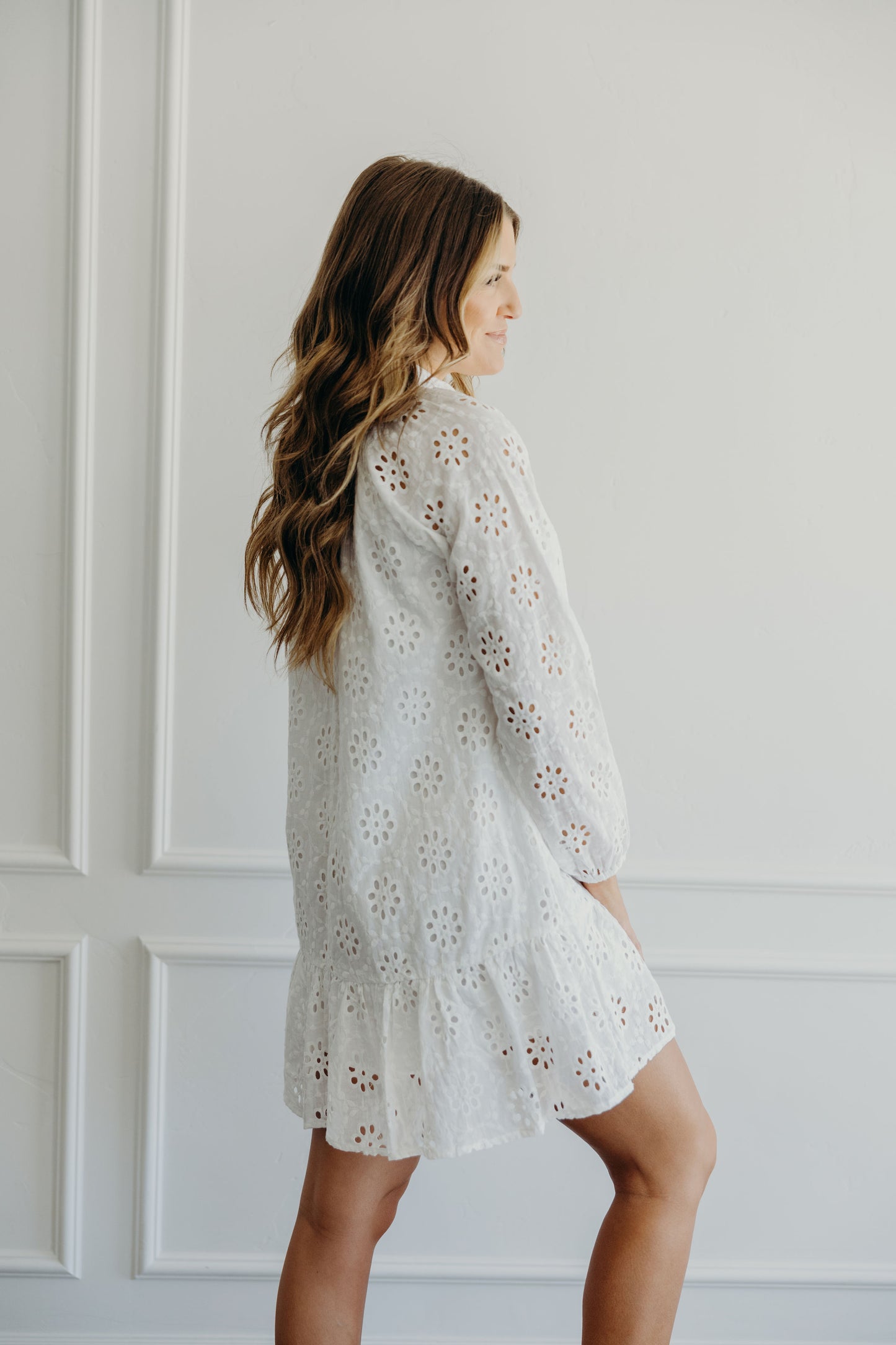 Long sleeve eyelet dress.