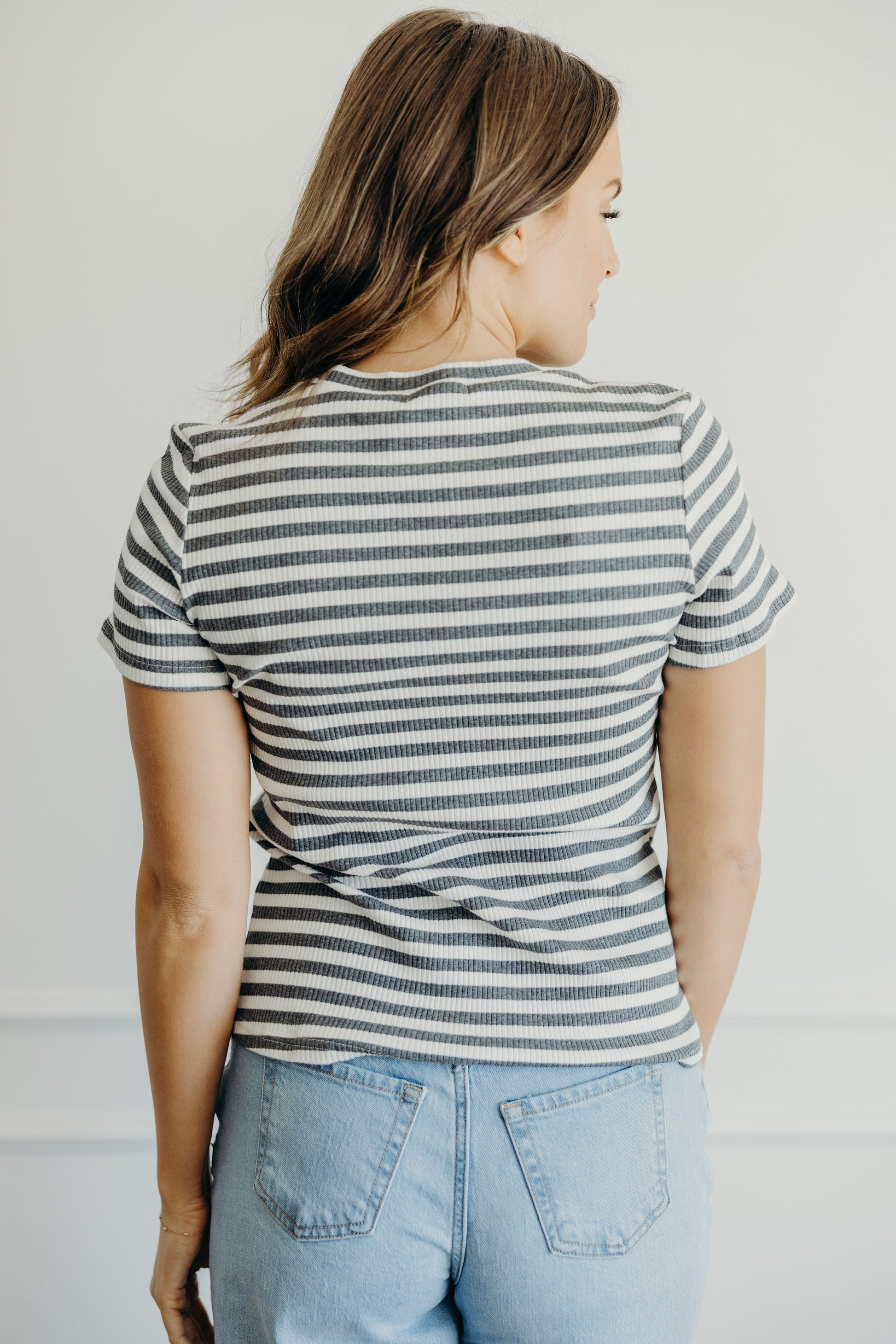 High necked striped short sleeve tee.