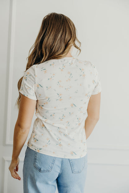 Ribbed tee with peach floral print.