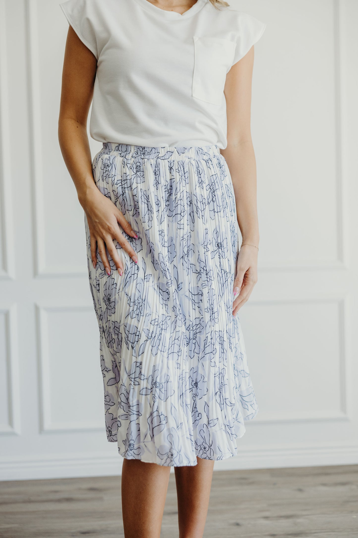 PLEATED MIDI SKIRT IN PERIWINKLE STENCIL