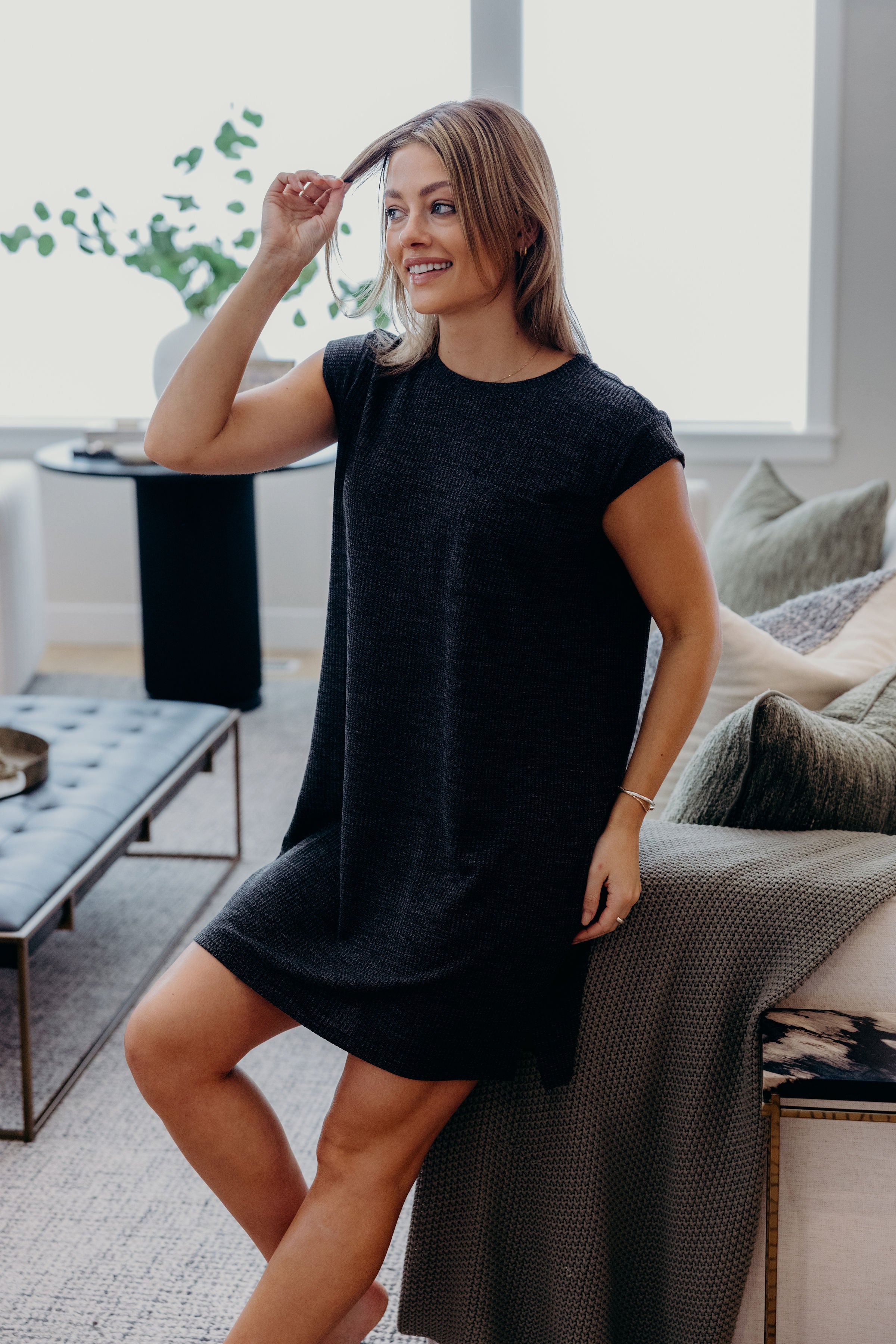 Short  textured shift dress with high neckline.