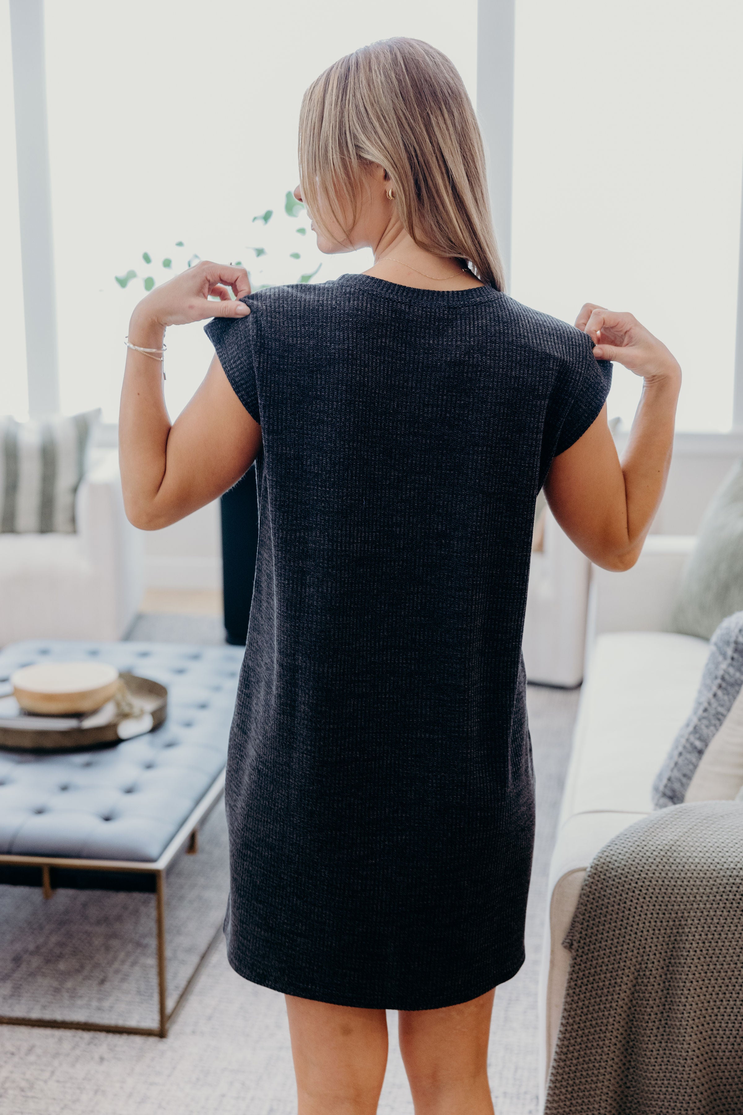 Textured knit shift dress with short sleeves.