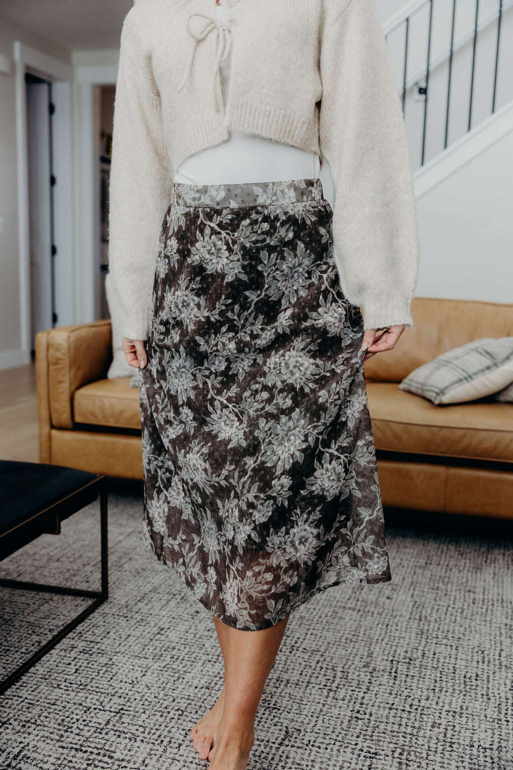 Textured green floral print skirt.
