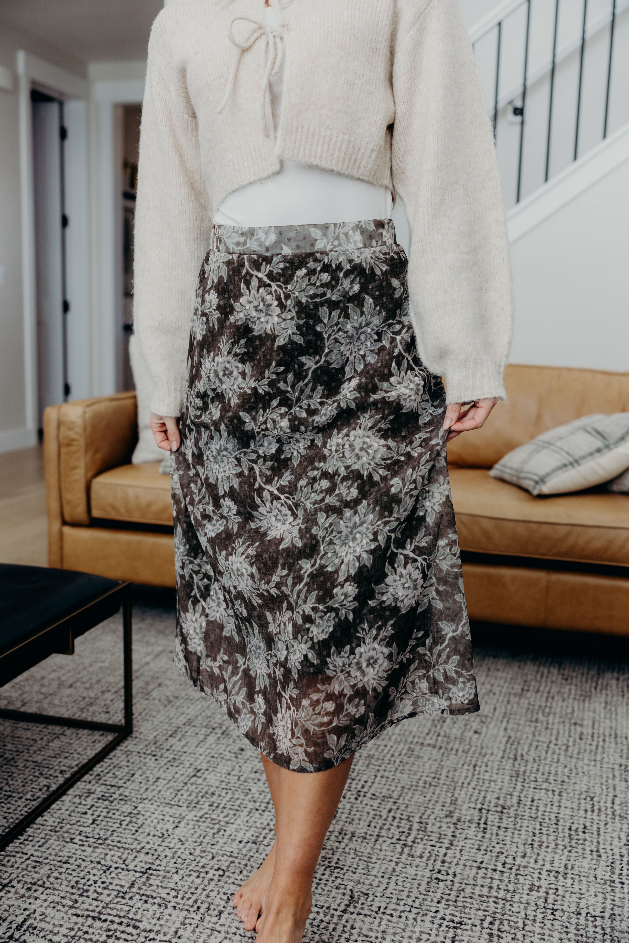 Textured green floral print skirt.
