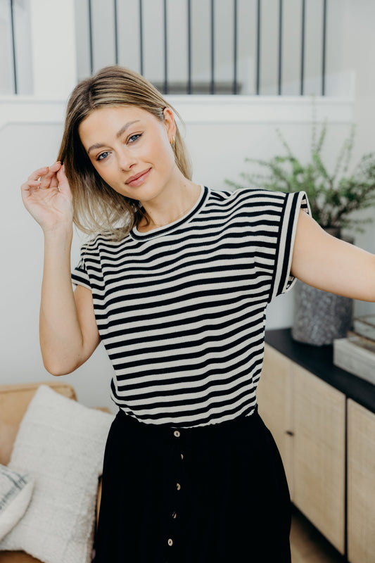 Boxy fit striped tee with crew neckline and short sleeves.