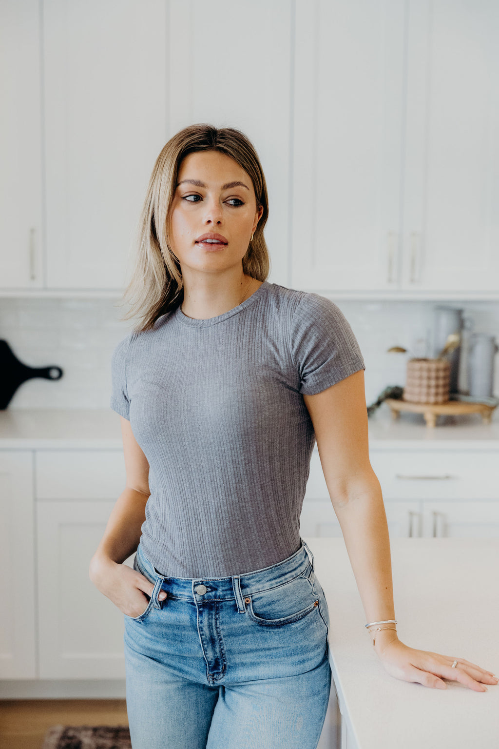 Short sleeve high neck textured top.