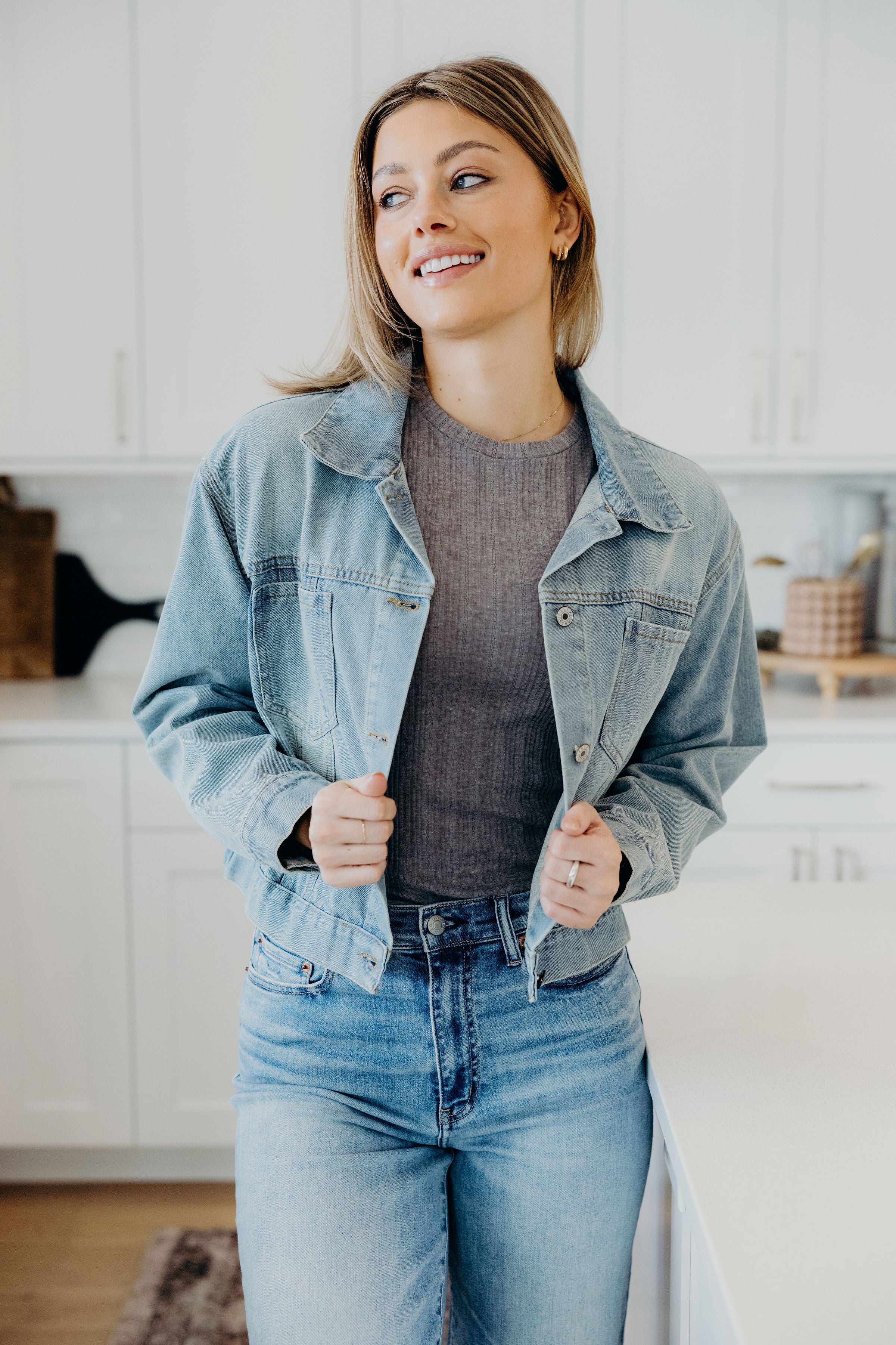 Pointelle iron gray top with high neckline.