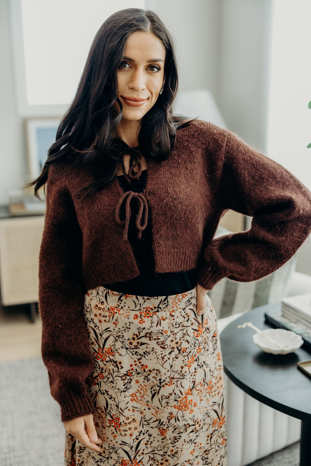 Brown crop sweater with ribbed hem and cuffs with 2 tie closures.