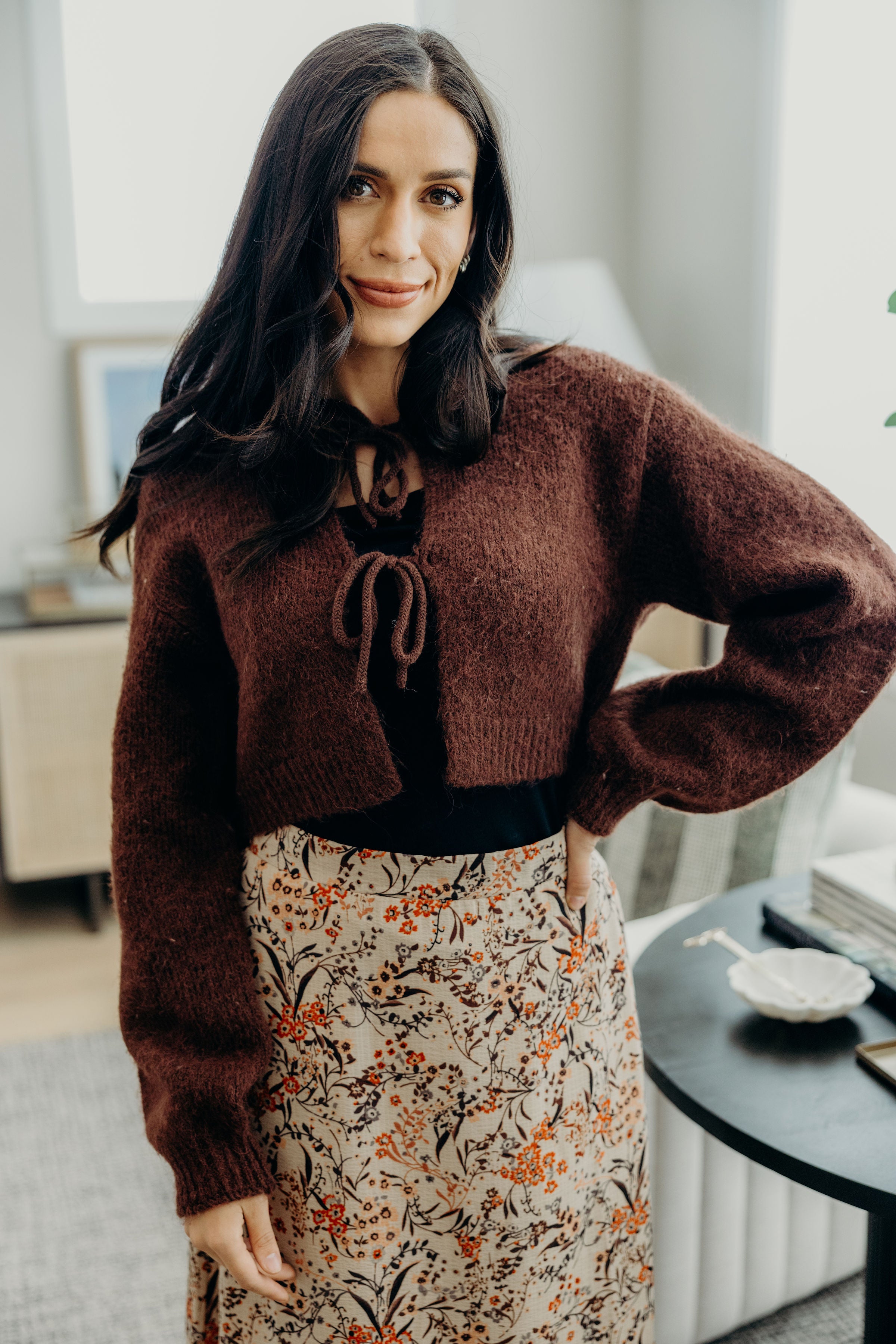 Brown crop sweater with ribbed hem and cuffs with 2 tie closures.