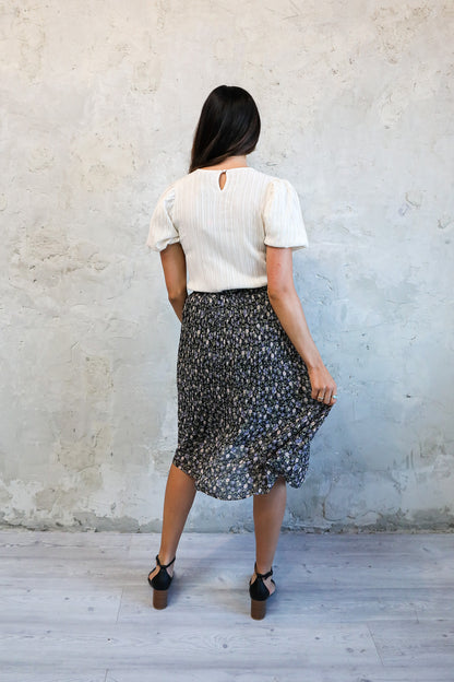 PLEATED MIDI SKIRT IN GRAPEVINE