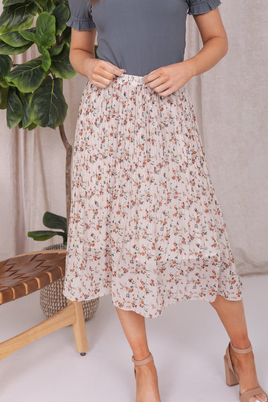 PLEATED MIDI SKIRT IN COTTAGE WHITE BLOSSOM