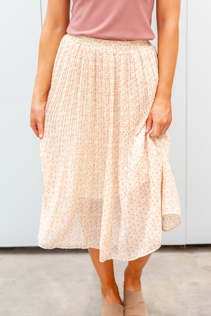 PLEATED MIDI SKIRT IN CORAL CLOUD FINAL SALE