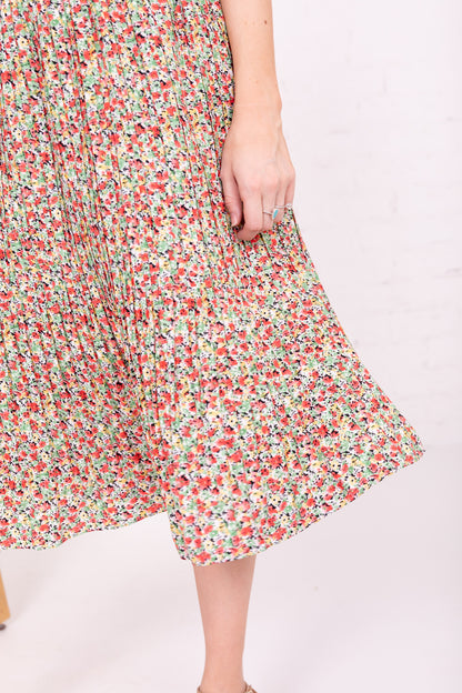 PLEATED MIDI SKIRT IN TROPICAL OASIS